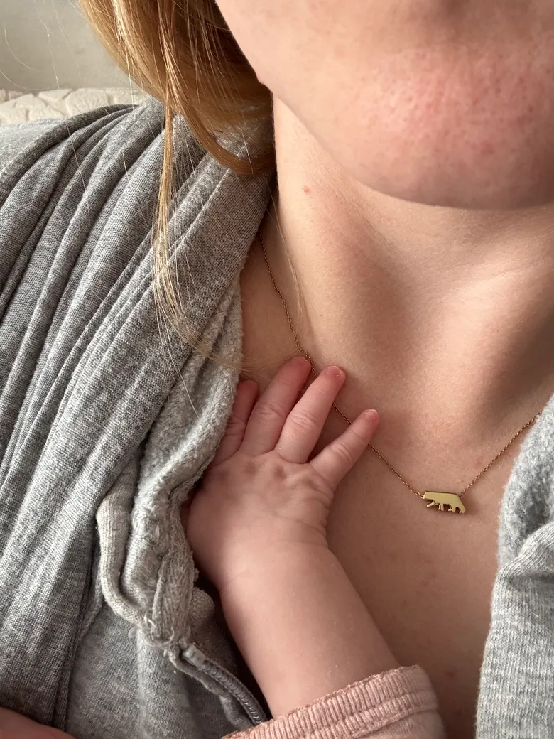 A close, tender moment between mother and baby